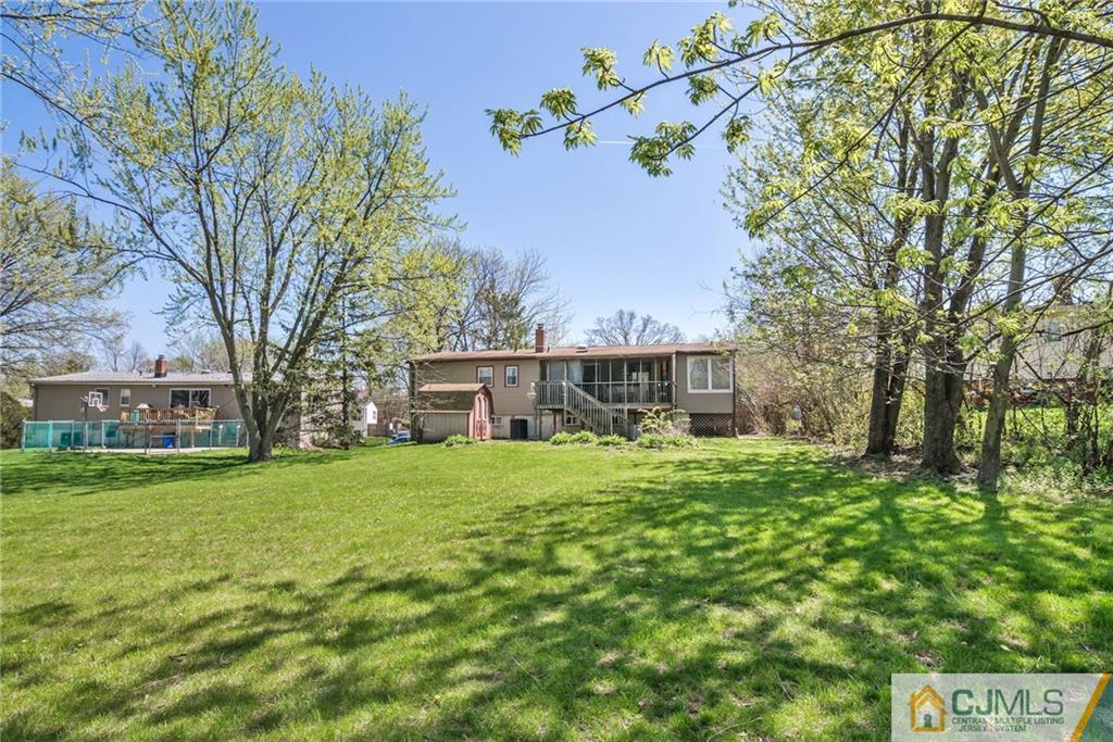17 Wilk Road Edison, NJ 08837 - Photo 20 of 22 a view of a house with a yard