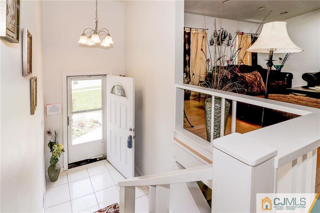 17 Wilk Road Edison, NJ 08837 - Photo 3 of 22 a view of a hallway with workspace