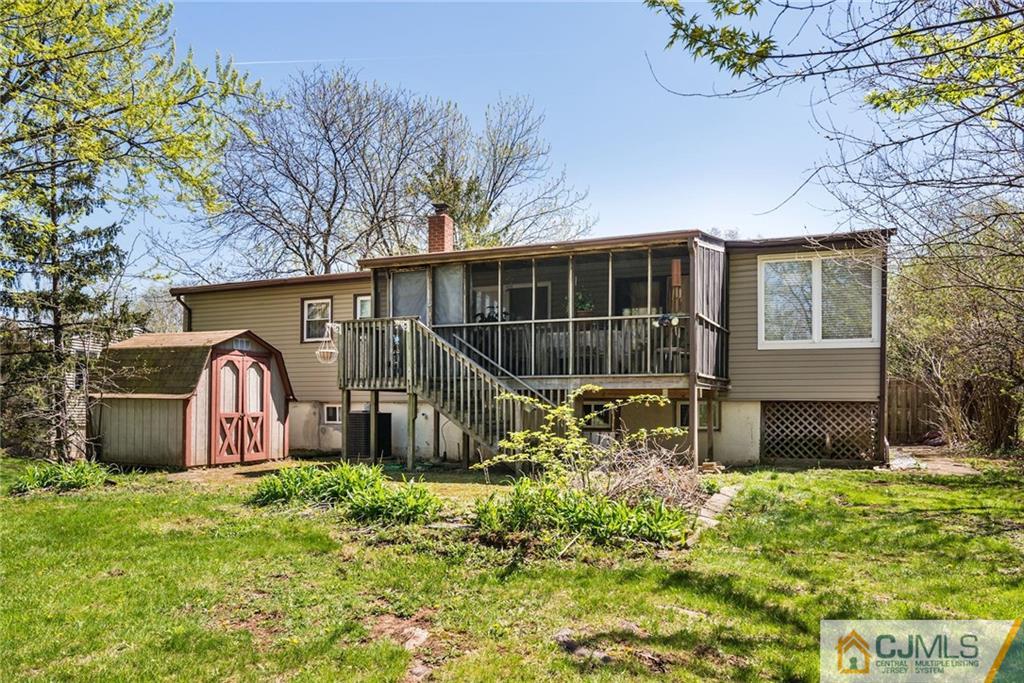 17 Wilk Road Edison, NJ 08837 - Photo 22 of 22 a front view of a house with garden