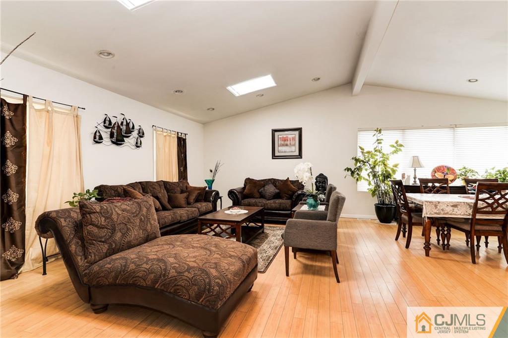 17 Wilk Road Edison, NJ 08837 - Photo 5 of 22 a living room with furniture and a wooden floor