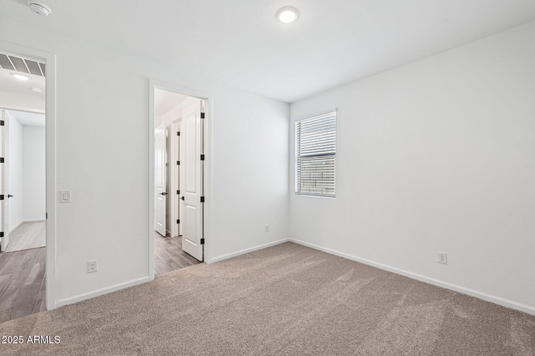 15794 West Cheryl Drive Waddell, AZ 85355 - Photo 18 of 53 an empty room with a empty space