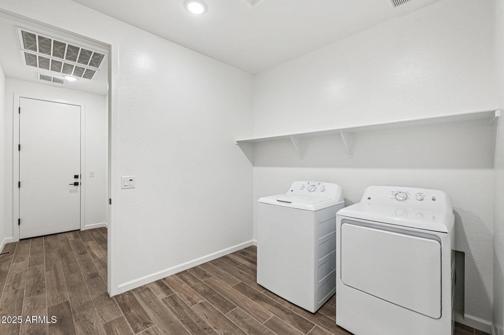 15794 West Cheryl Drive Waddell, AZ 85355 - Photo 23 of 53 a utility room with dryer and washer