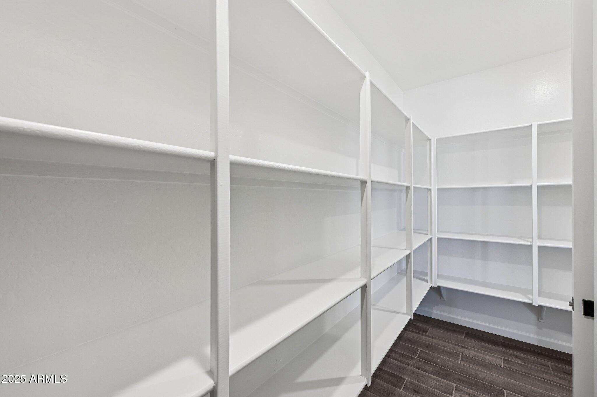 15794 West Cheryl Drive Waddell, AZ 85355 - Photo 29 of 53 a hallway with closet