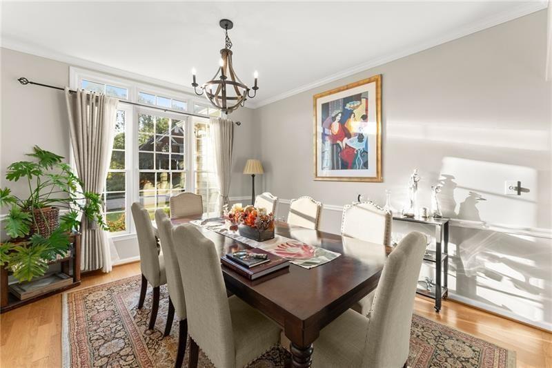 385 Graves Road Acworth, GA 30101 - Photo 12 of 61 a view of a dining room with furniture window and wooden floor