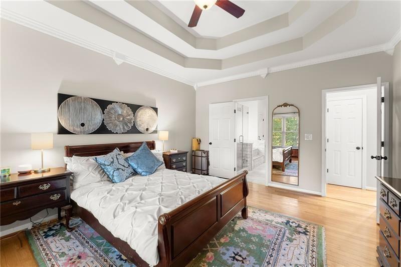 385 Graves Road Acworth, GA 30101 - Photo 20 of 61 a bed room with a bed and a painting on the wall