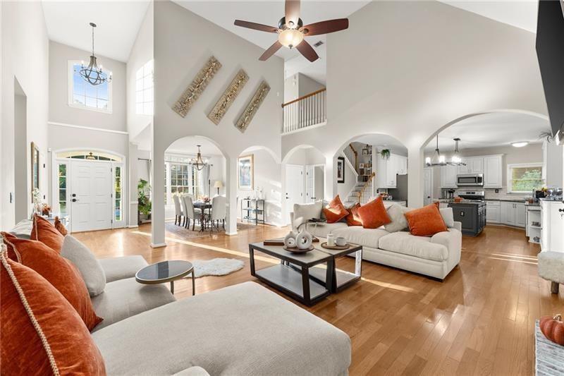 385 Graves Road Acworth, GA 30101 - Photo 2 of 61 a living room with furniture kitchen view and a chandelier