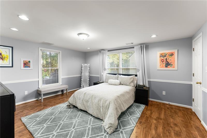 385 Graves Road Acworth, GA 30101 - Photo 35 of 61 a bedroom with a large bed and a window