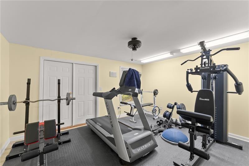 385 Graves Road Acworth, GA 30101 - Photo 37 of 61 a view of a room with gym equipment