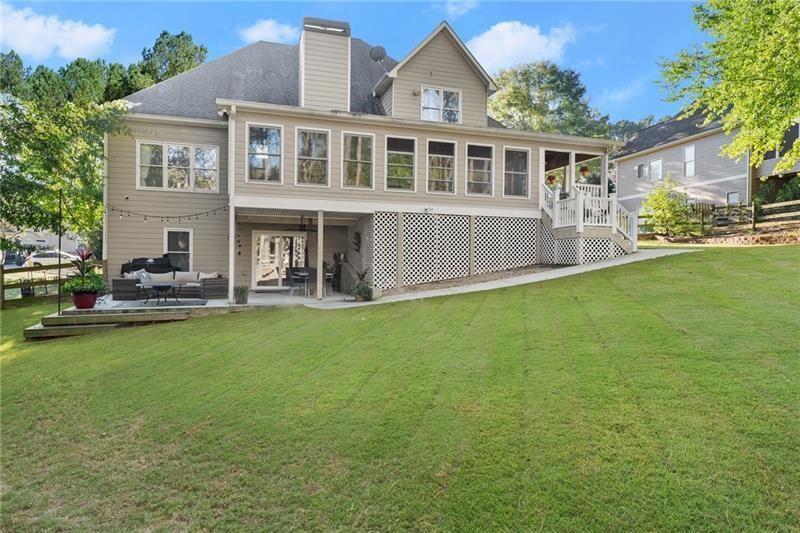 385 Graves Road Acworth, GA 30101 - Photo 44 of 61 a front view of a house with garden
