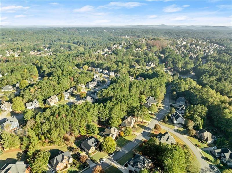 385 Graves Road Acworth, GA 30101 - Photo 47 of 61 an aerial view of residential houses with outdoor space and trees