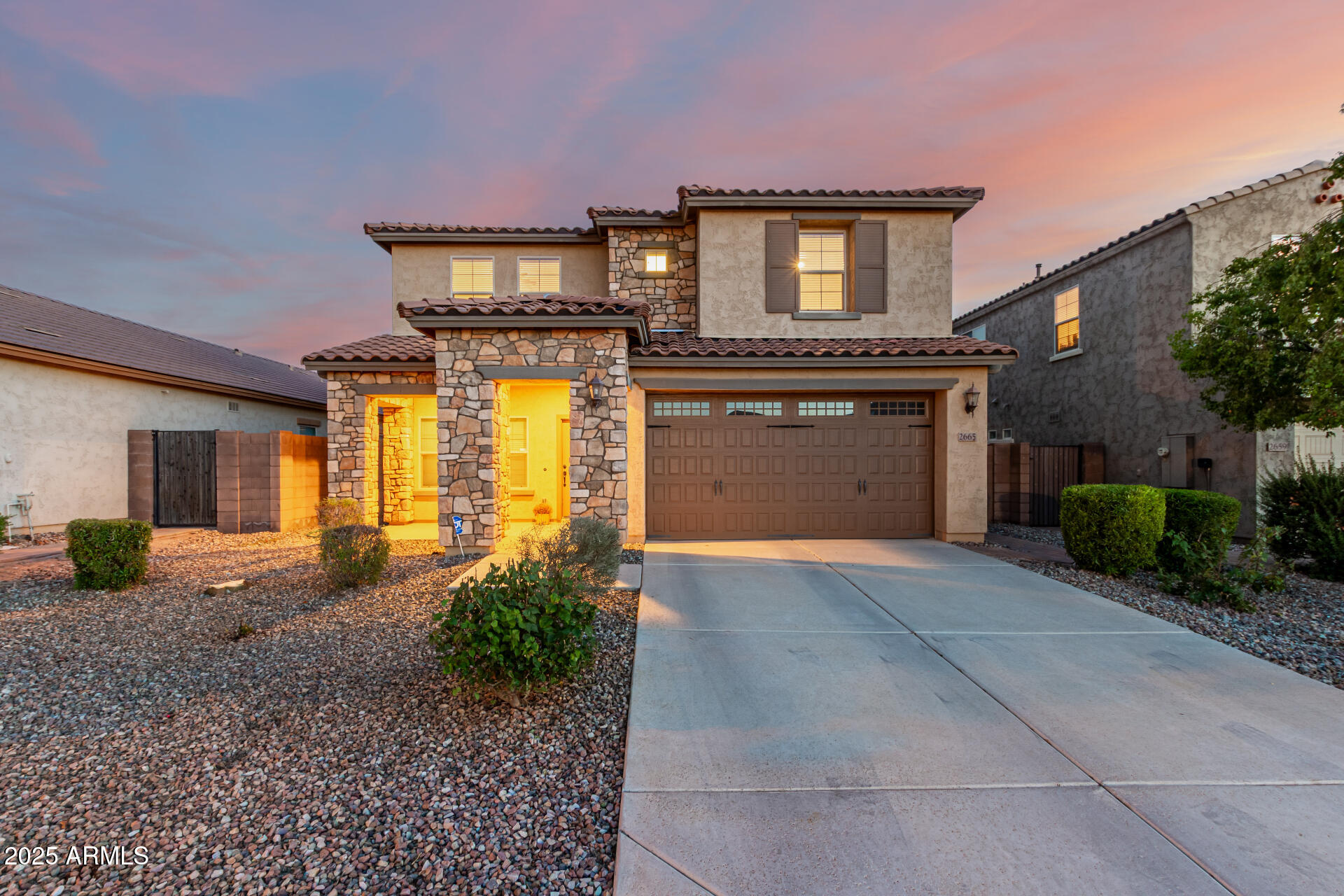 2665 East Gillcrest Road Gilbert, AZ 85298 - Photo 1 of 48 a front view of a house with garden