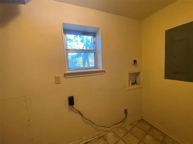 a view of gallery with windows