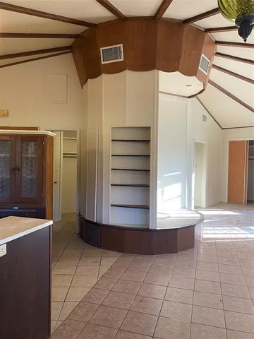 a view of a room with an empty space