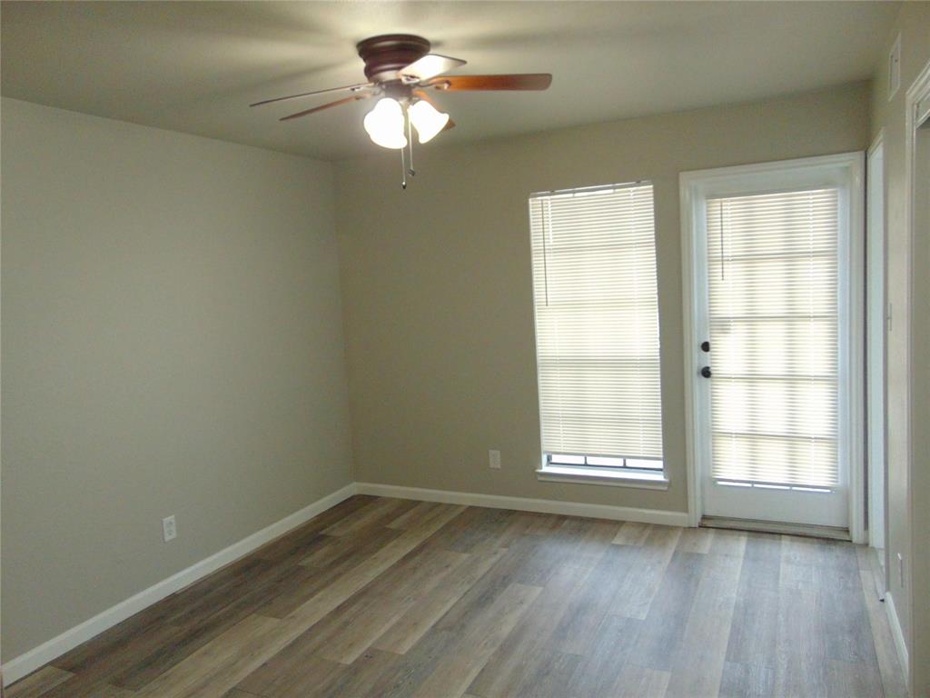 6108 Abrams Road, Unit 311 Dallas, TX 75231 - Photo 7 of 14 an empty room with a window