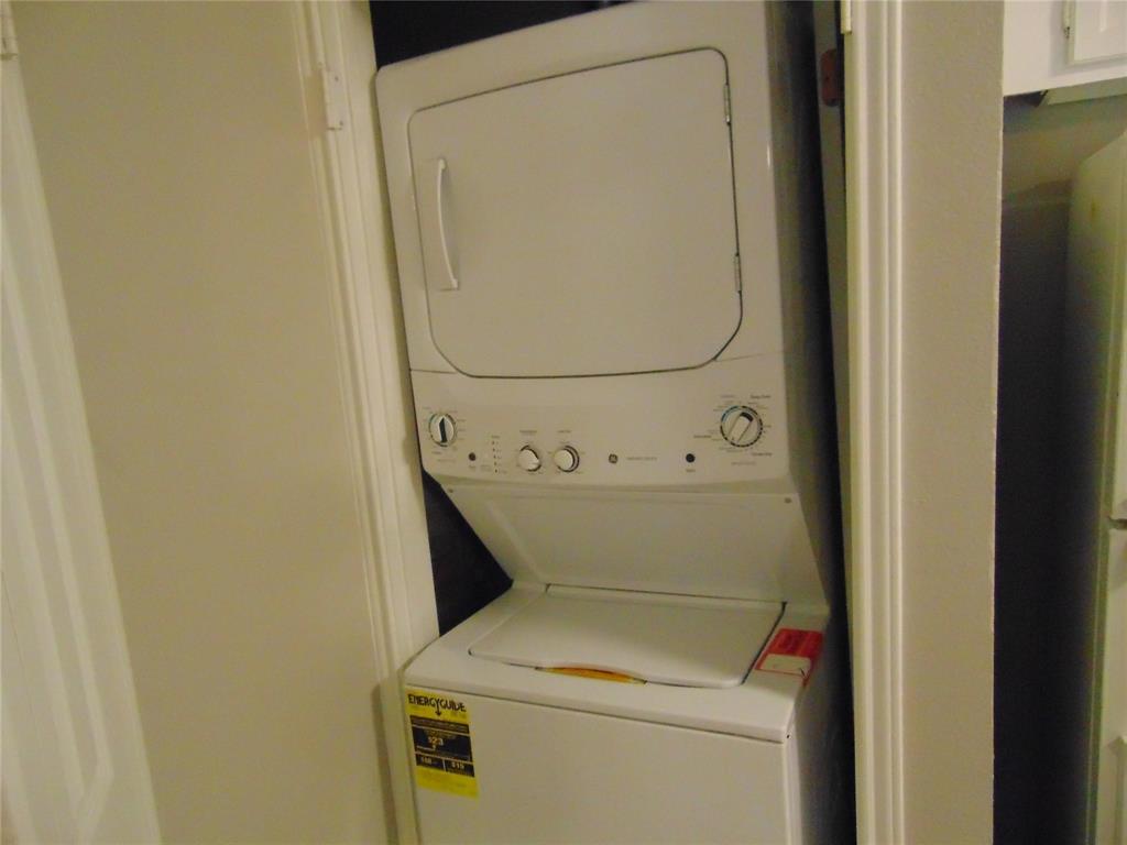 6108 Abrams Road, Unit 311 Dallas, TX 75231 - Photo 10 of 14 a utility room with dryer and washer
