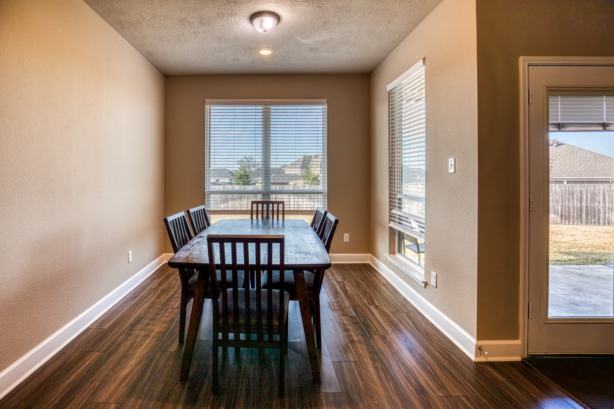 2004 Vineyard Pass Brenham, TX 77833 - Photo 12 of 37 a view of a dining room with furniture window and outside view
