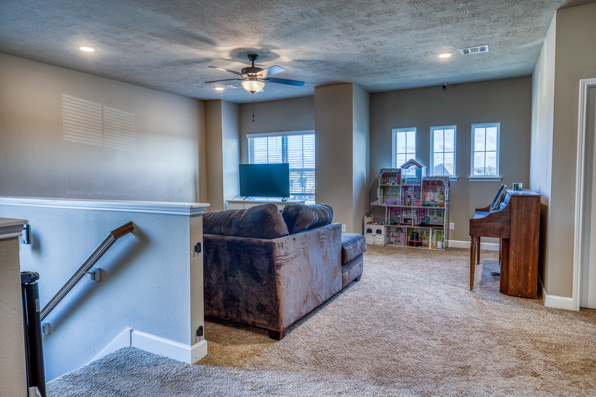 2004 Vineyard Pass Brenham, TX 77833 - Photo 21 of 37 a living room with furniture and a chandelier