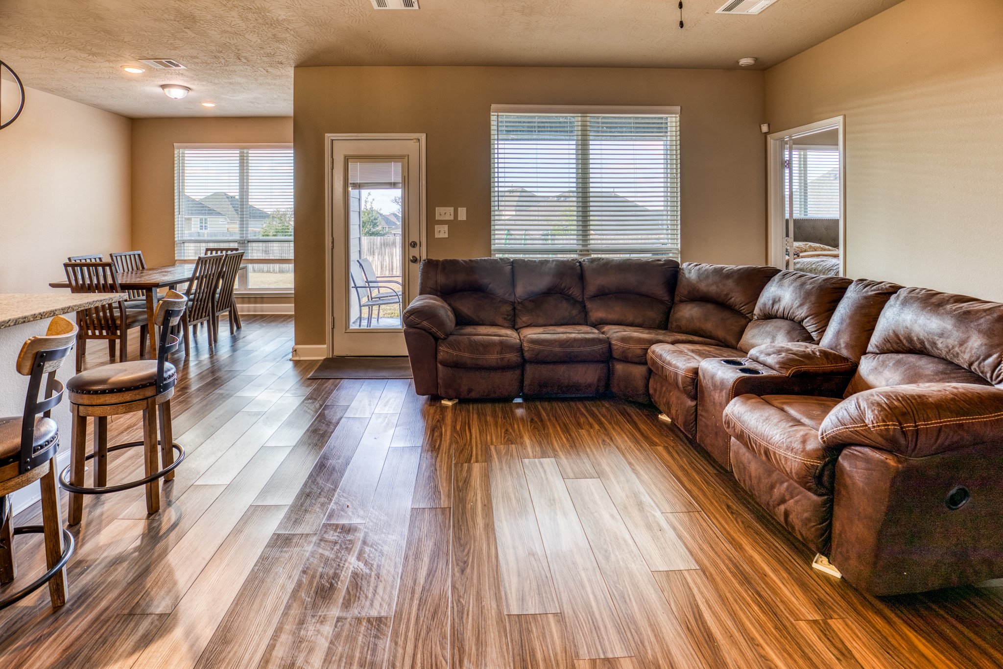 2004 Vineyard Pass Brenham, TX 77833 - Photo 4 of 37 a living room with furniture and wooden floor