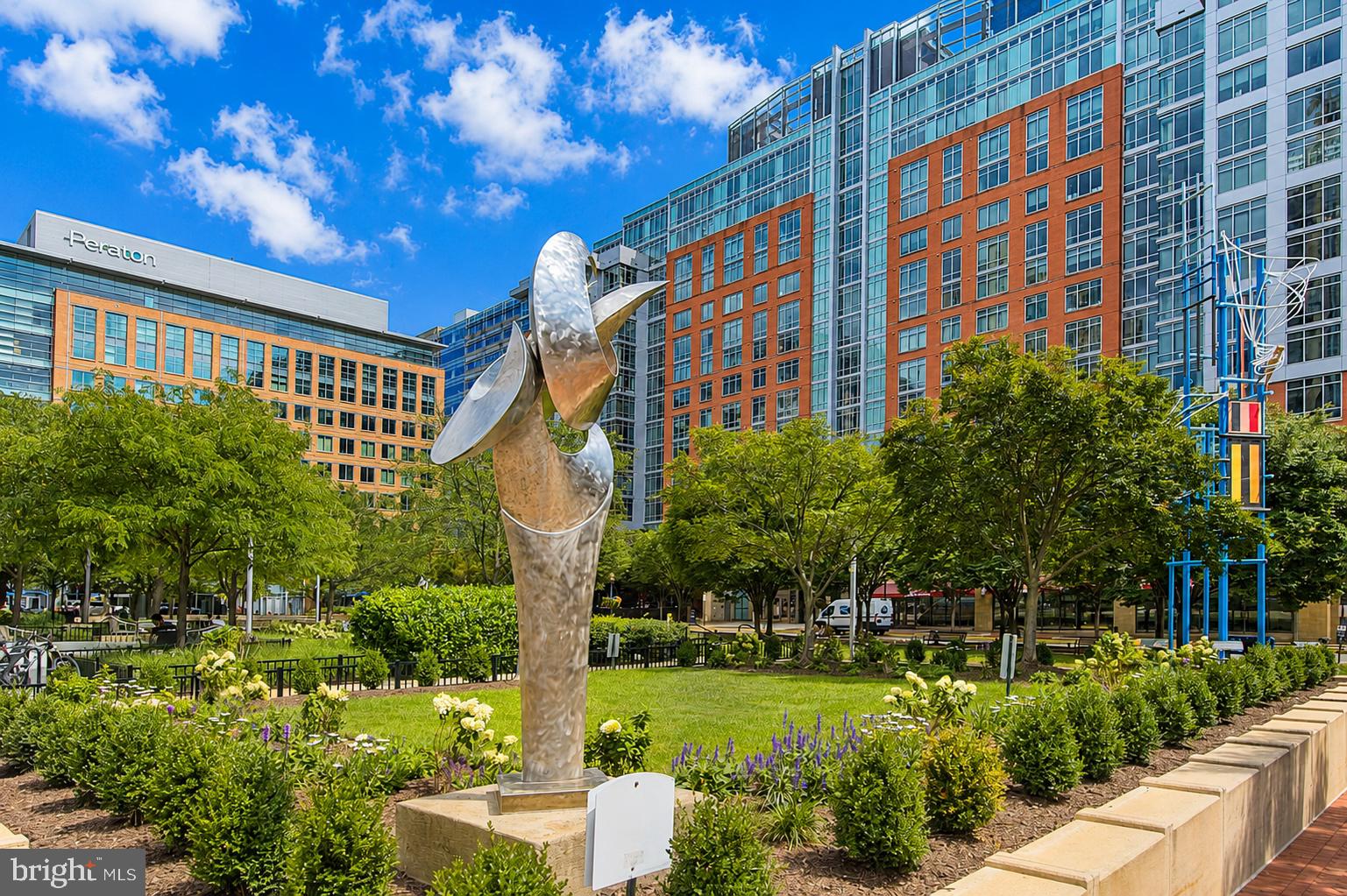 11990 Market Street, Unit 1403 Reston, VA 20190 - Photo 54 of 58 Sculpture overlooks the town green