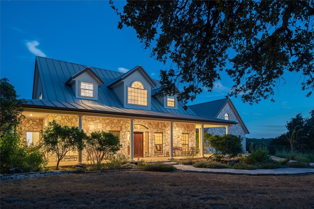 1401 Estrellita Ranch Road Canyon Lake, TX 78133 - Photo 1 of 1 a front view of a house with a porch