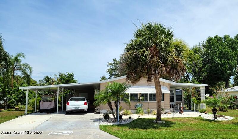 926 Yew Street Sebastian, FL 32976 - Photo 2 of 36 a front view of a house with garden