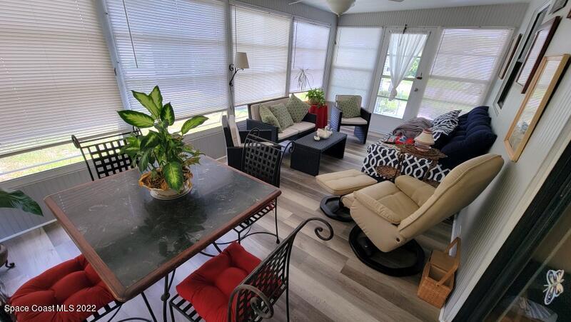 926 Yew Street Sebastian, FL 32976 - Photo 21 of 36 a view of living room with furniture and a potted plant
