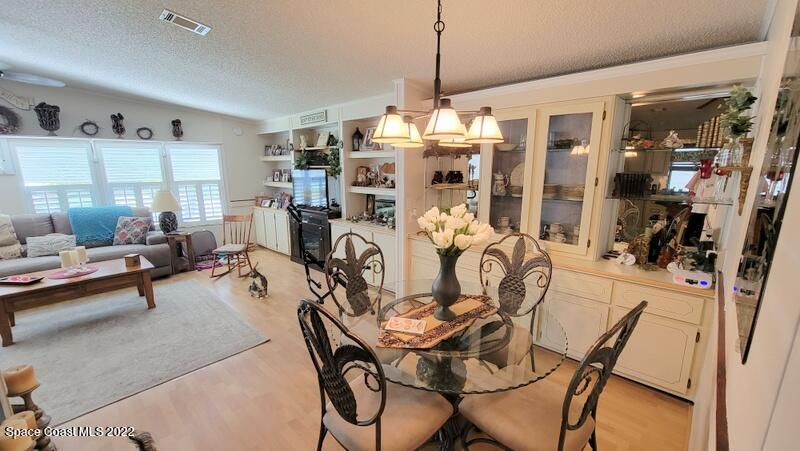 926 Yew Street Sebastian, FL 32976 - Photo 10 of 36 a view of a livingroom and dining room