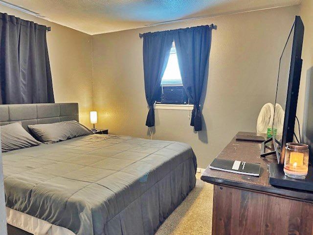 557-28 28 3/4 Road Grand Junction, CO 81501 - Photo 9 of 19 a bedroom with a bed and a window
