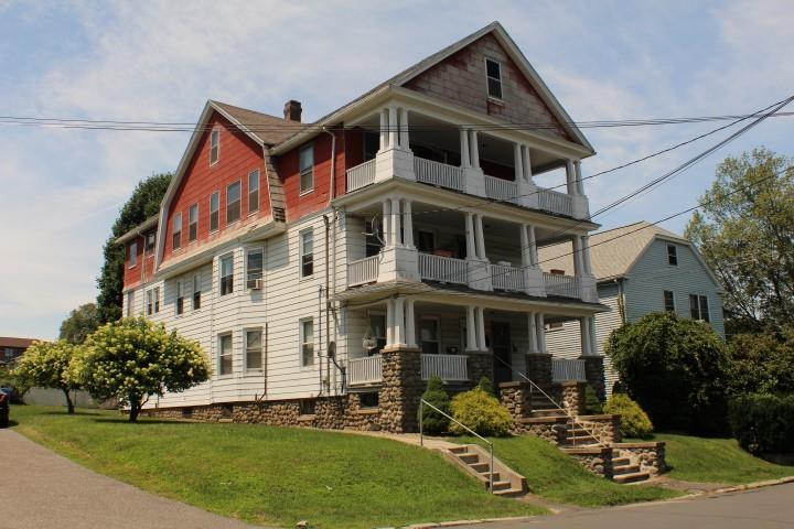 72 Chambers Street Waterbury, CT 06708 - Photo 1 of 1 a front view of a house with yard