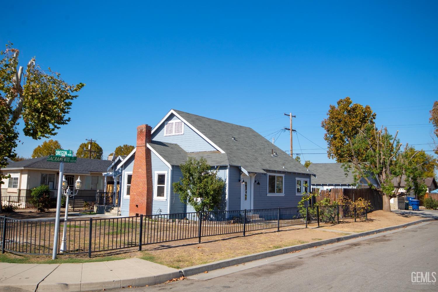 Undisclosed Address Bakersfield, CA 93305 - Photo 3 of 20 front view of a house with a porch