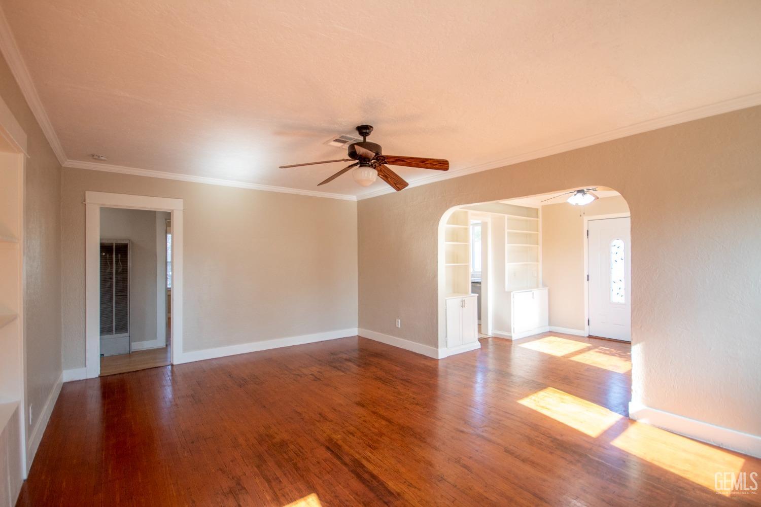 Undisclosed Address Bakersfield, CA 93305 - Photo 6 of 20 a view of a livingroom with wooden floor