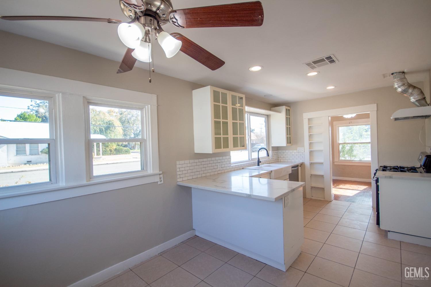 Undisclosed Address Bakersfield, CA 93305 - Photo 10 of 20 a large living room with a large window