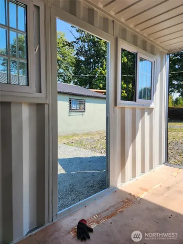a view of a backyard of the house