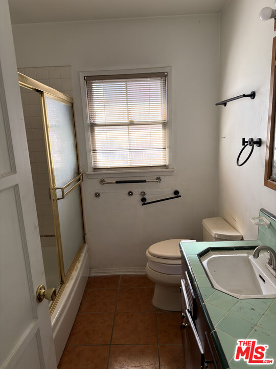 8230 Kyle Street Sunland, CA 91040 - Photo 12 of 13 a bathroom with a sink toilet and shower