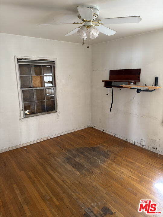 8230 Kyle Street Sunland, CA 91040 - Photo 10 of 13 a view of empty room with wooden floor