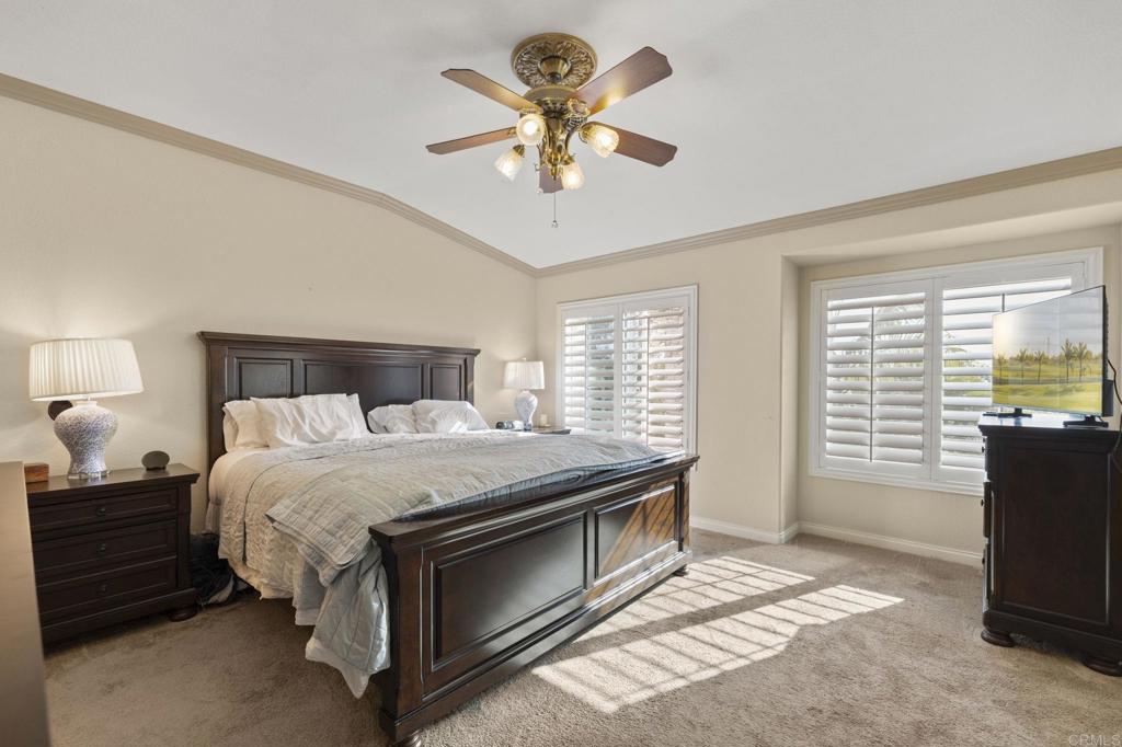3033 Rancho La Presa Carlsbad, CA 92009 - Photo 16 of 46 a bedroom with a bed and a tv