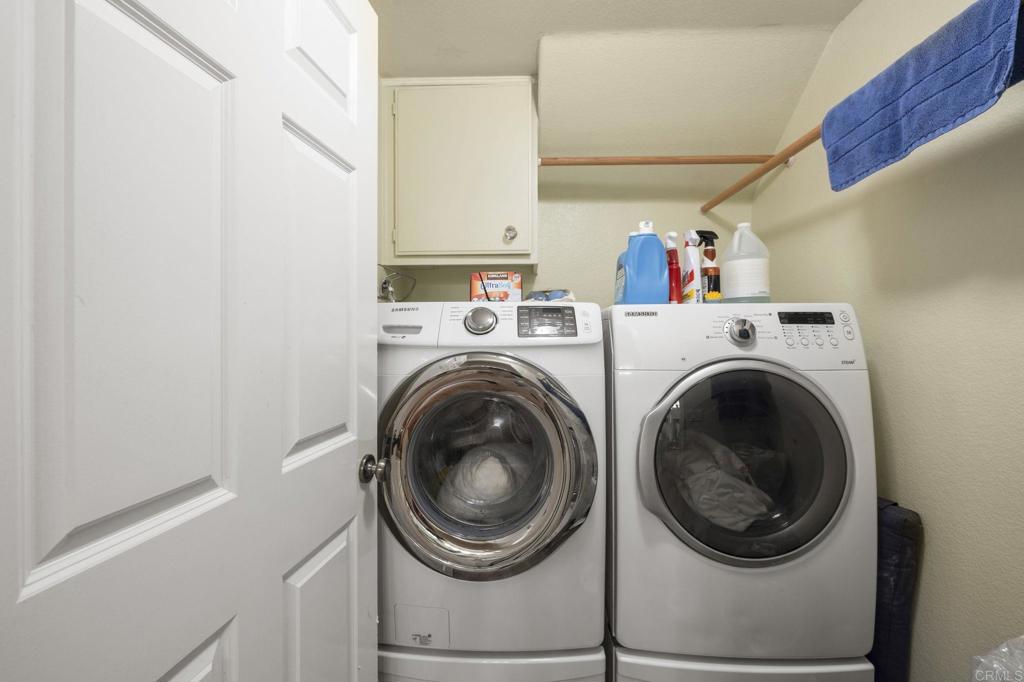 3033 Rancho La Presa Carlsbad, CA 92009 - Photo 24 of 46 a utility room with dryer and washer