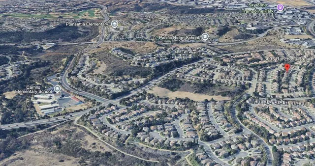 an aerial view of house with yard