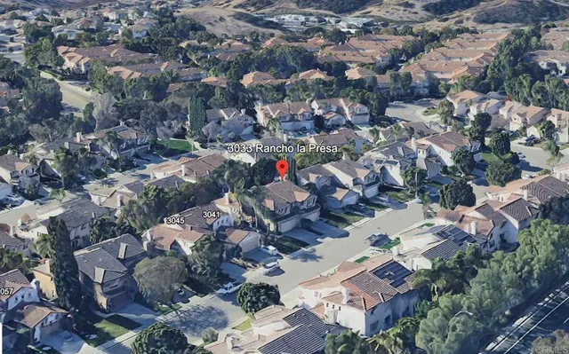 an aerial view of a city with lots of residential buildings