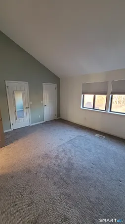 an empty room with windows