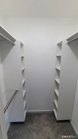 a view of an empty walk in closet