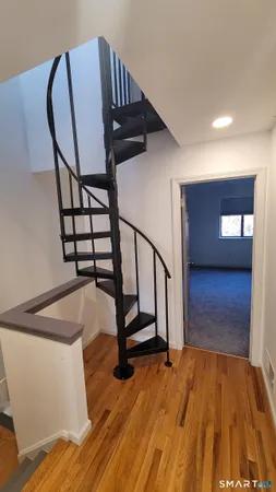 a view of entryway with a front door