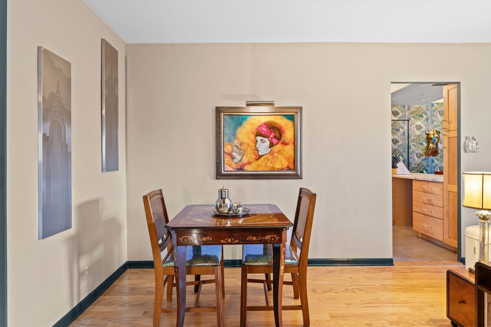 6040 Boulevard East, Unit MA West New York, NJ 07093 - Photo 5 of 35 a view of a dining room with furniture and wooden floor