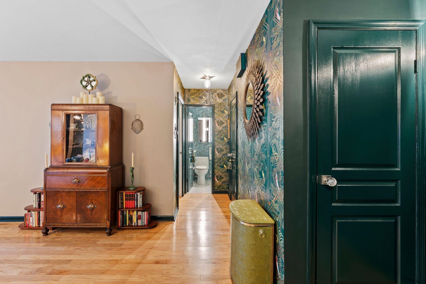 6040 Boulevard East, Unit MA West New York, NJ 07093 - Photo 9 of 35 a view of a hallway with entryway dining room and hall with wooden floor