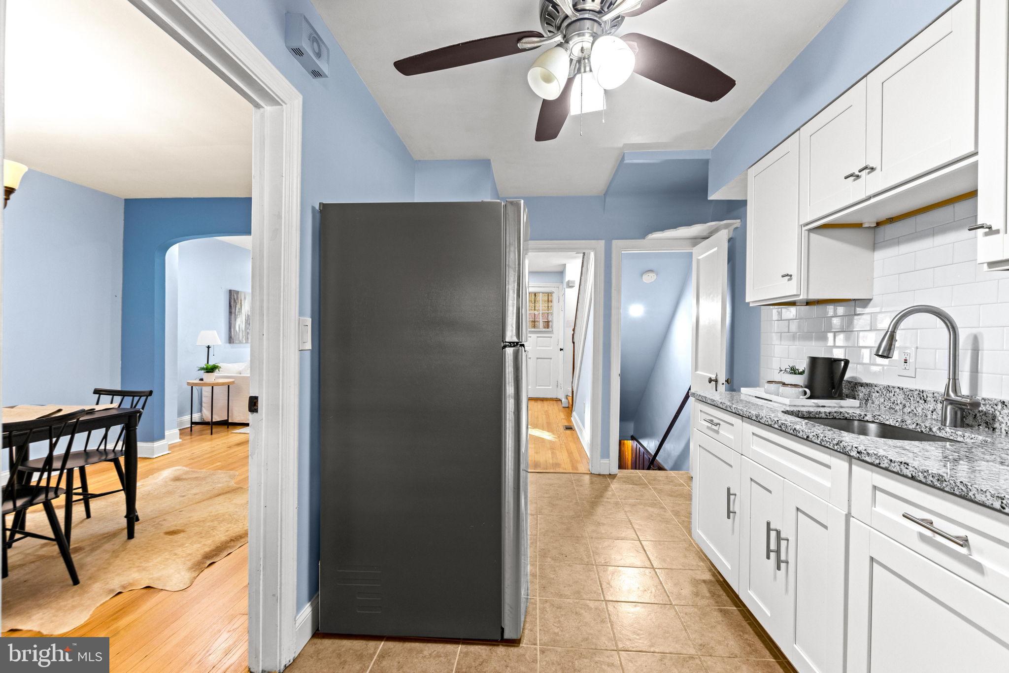 3807 Kimble Road Baltimore, MD 21218 - Photo 13 of 39 a bathroom with a sink and a mirror