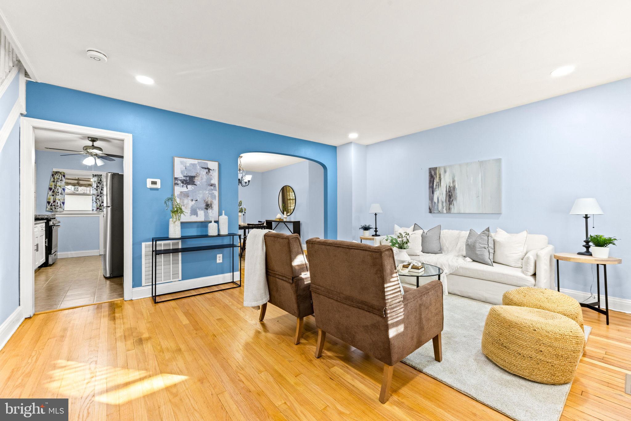 3807 Kimble Road Baltimore, MD 21218 - Photo 5 of 39 a living room with furniture and a table