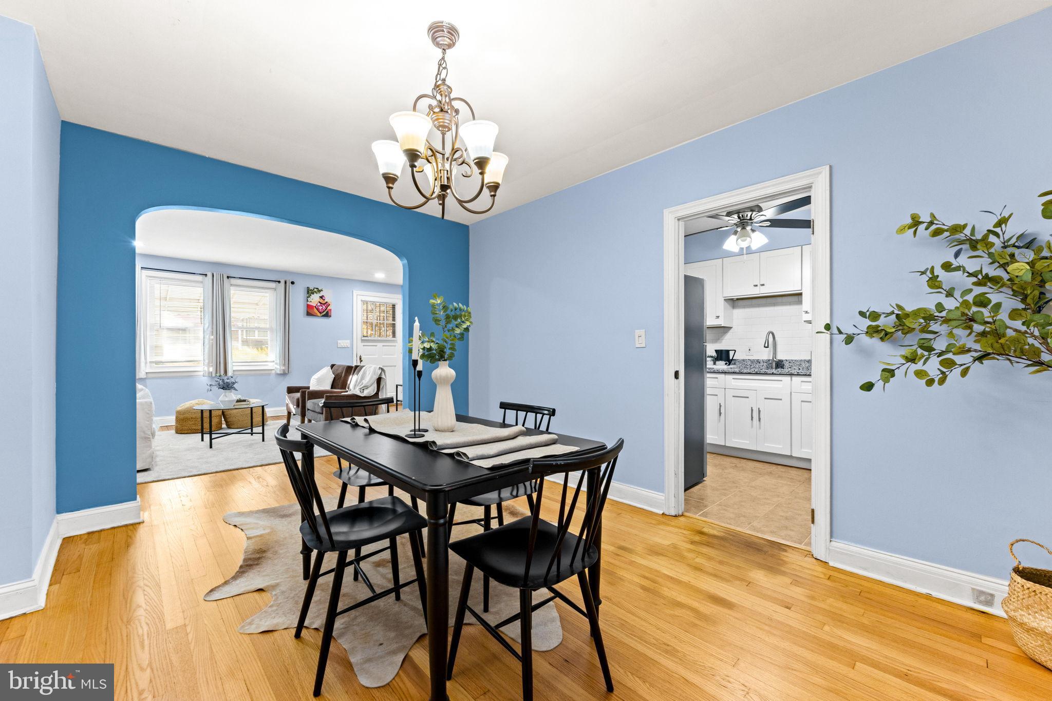 3807 Kimble Road Baltimore, MD 21218 - Photo 9 of 39 a view of a dining room with furniture and chandelier
