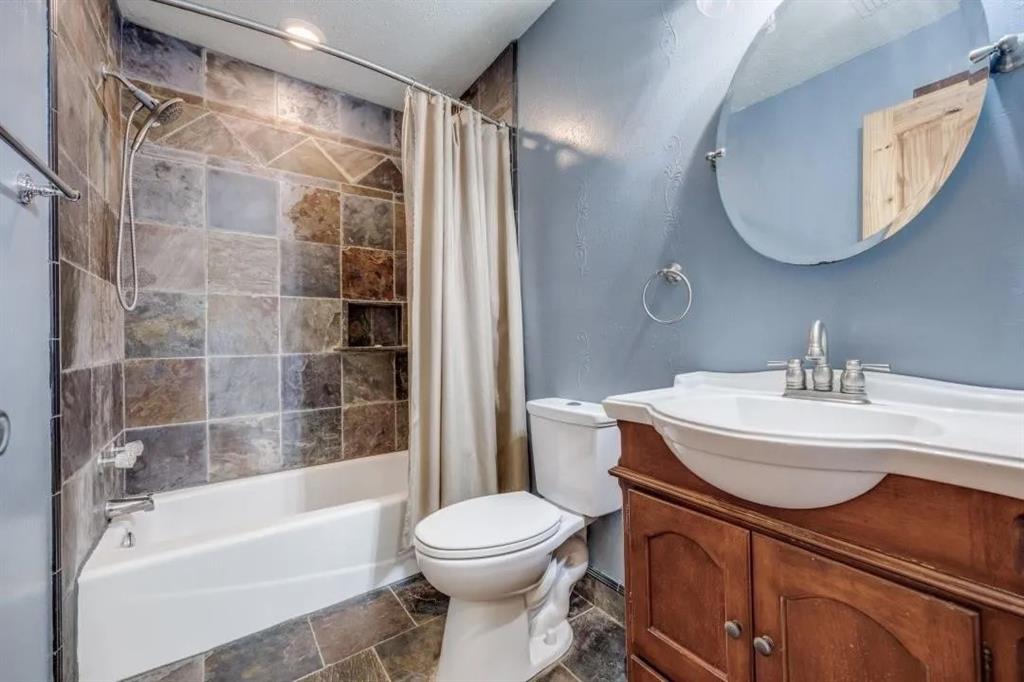 17877 Fm 902 Howe, TX 75459 - Photo 7 of 11 a bathroom with a sink toilet and shower