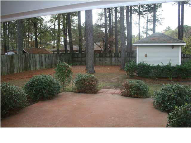 530 Old Rice Road Madison, MS 39110 - Photo 2 of 16 backyard and storage building