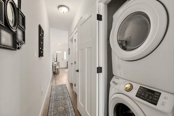 a view of entryway with washer and dryer
